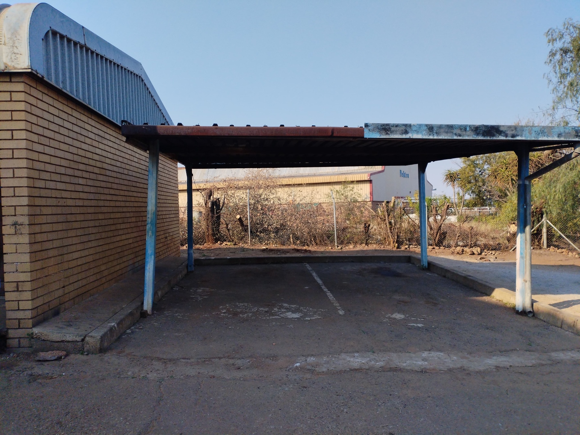 Covered parking bay at the workshop
